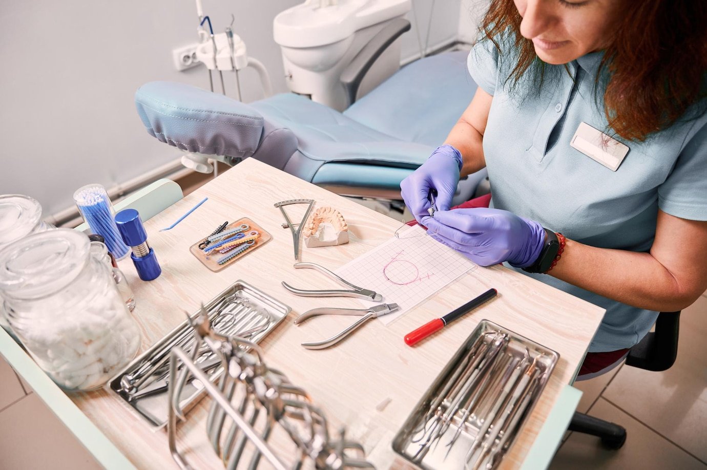 Willow Grove Dental Implants Center - Female orthodontist working in dental office